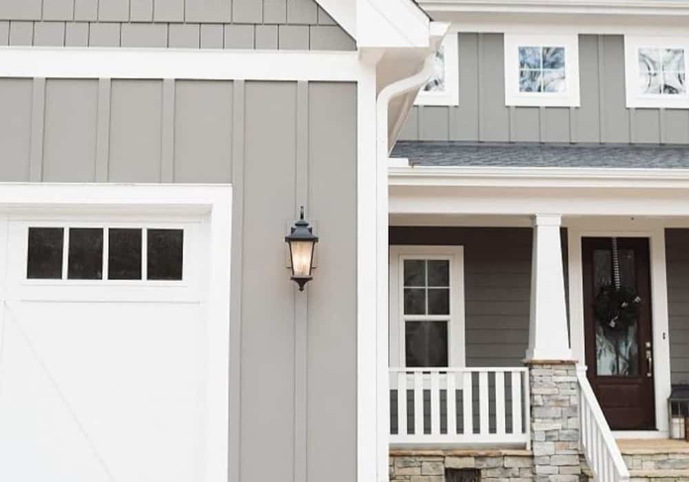 Gray siding with white mobile home