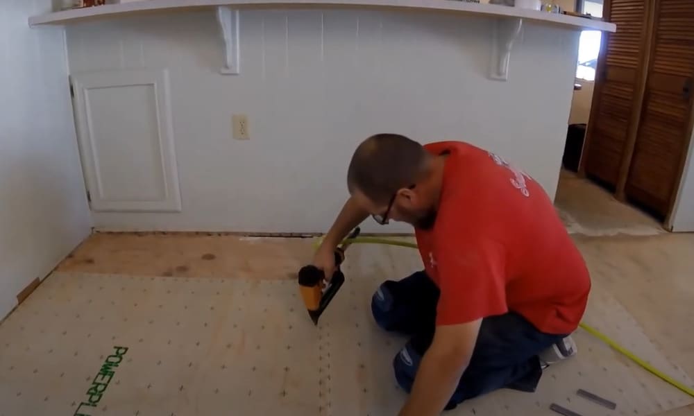 Install the plywood on the floor