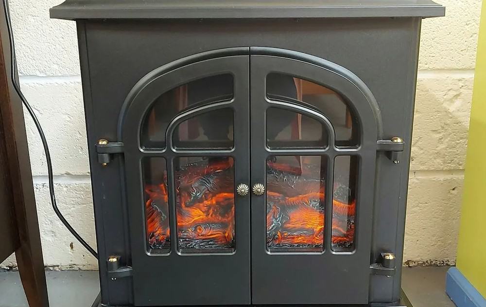 black electric fireplace with two doors